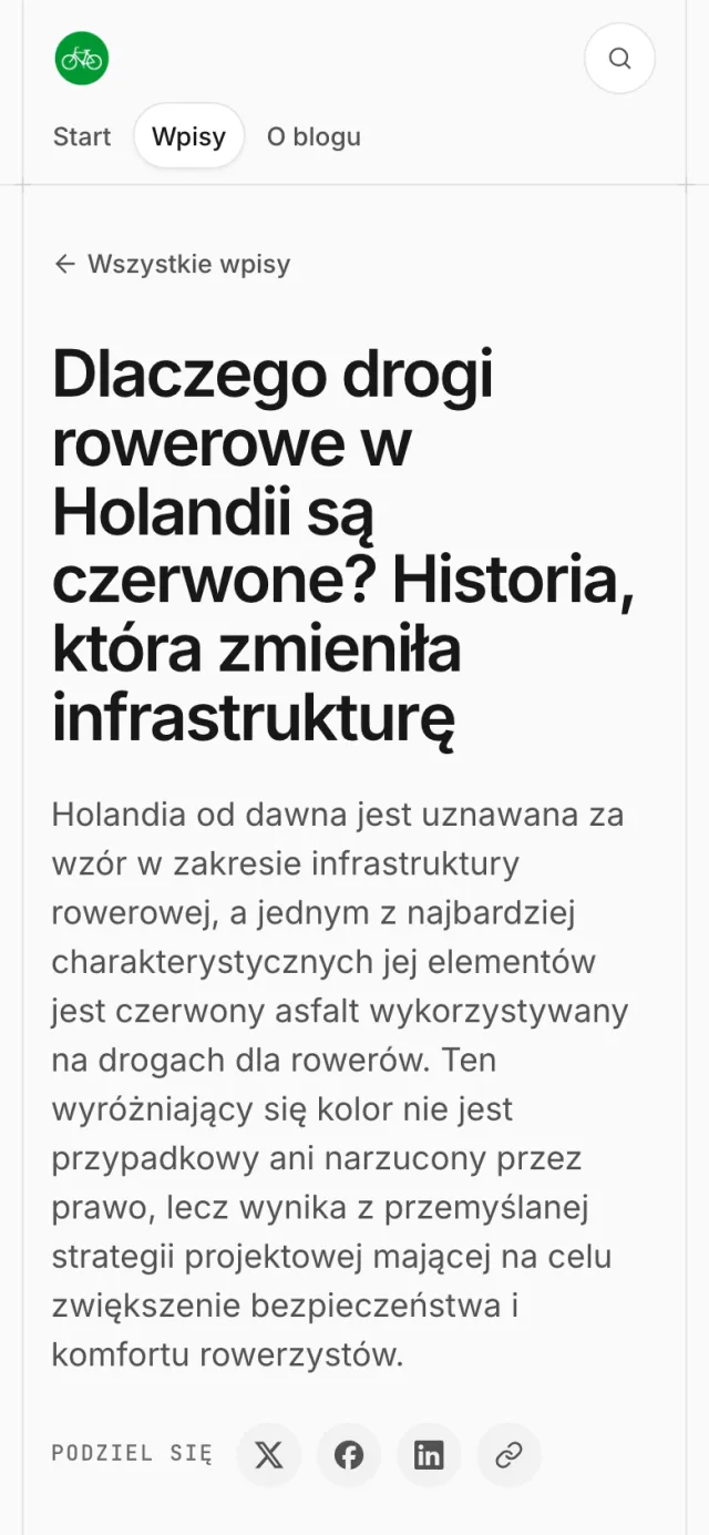 Nowy wpis na telefonie: logo, menu i wyszukiwarka, pod nimi od razu tytuł, wstęp i przyciski udostępniania.
