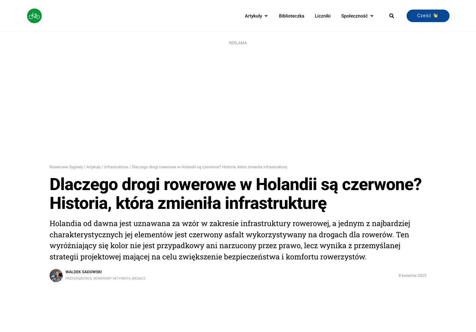 Stary wpis „Dlaczego drogi rowerowe w Holandii są czerwone?”: pod menu duże miejsce na reklamę, niżej okruszki, tytuł i wstęp pisany szeryfową czcionką.